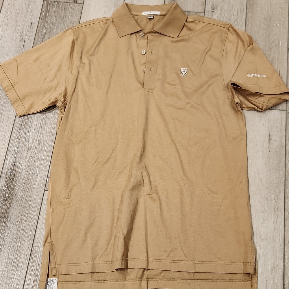 Peter Millar size medium short sleeve polo with queen wood on sleeve